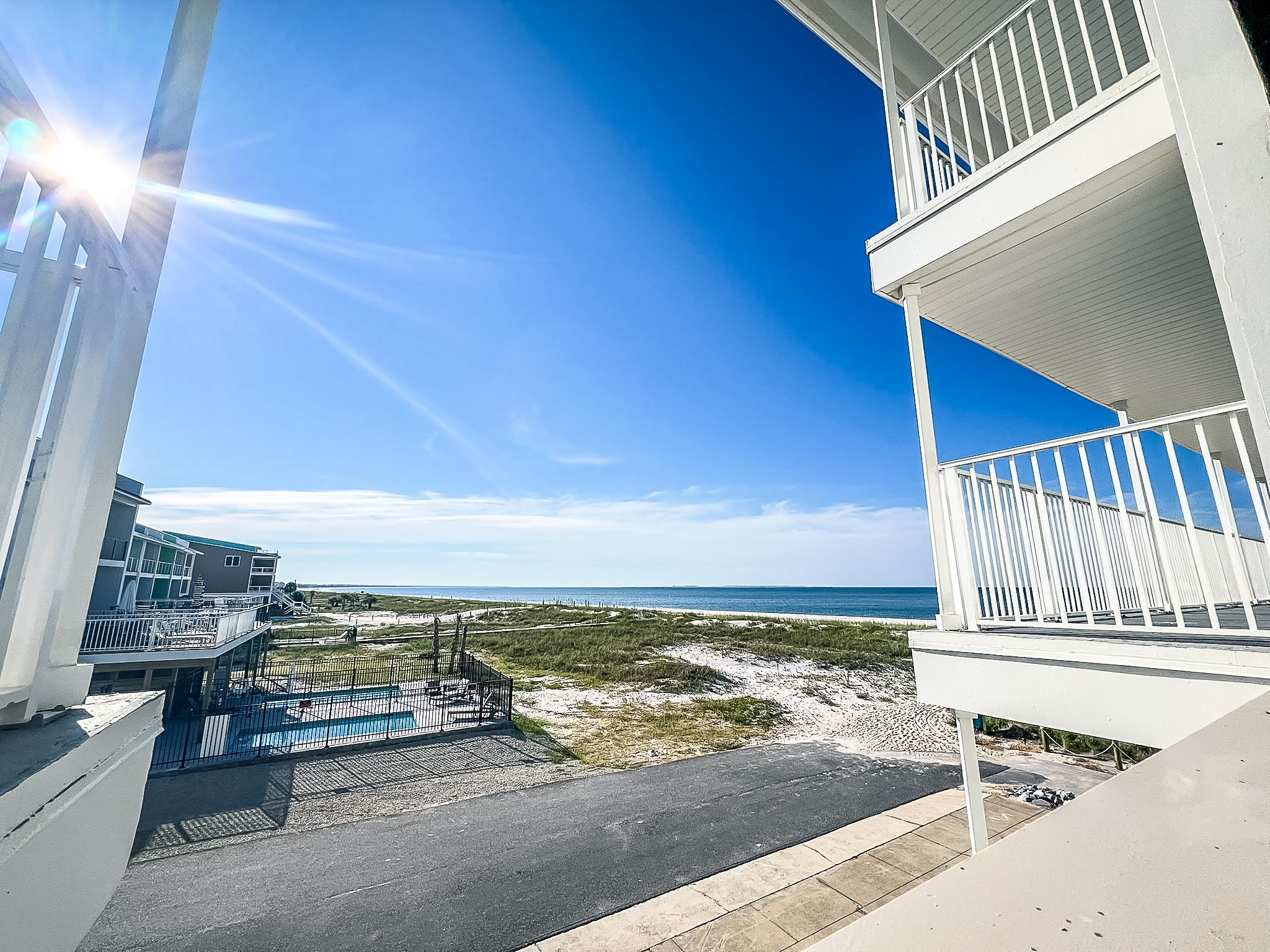 a group of family members kayaking in bright green kayaks in a canal
